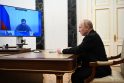 Rusijos prezidentas Vladimiras Putinas dalyvauja susitikime dėl Krymo įvykių per vaizdo ryšį.