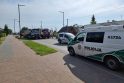 Kraupi avarija Karmėlavoje: smėlį vežęs sunkvežimis įvažiavo į vilkiką, teko vaduoti vairuotoją