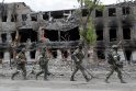 Karas: Mariupolio daugiabučio griuvėsiuose aptikta 200 smarkiai apirusių kūnų