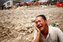 Kinai gedės daugiau nei 1 200 nuo žemės nuošliaužų žuvusių tautiečių