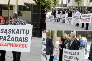 Šventines studentų eitynes palydėjo protestas: „Skurstantys universitetai – gėda valstybei“